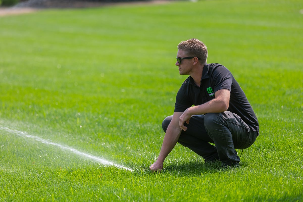 crew technician irrigation lawn green grass turf service sprinkler water adjust 3