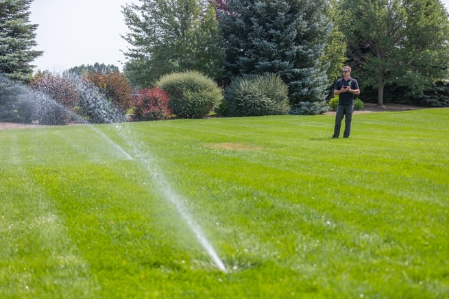 crew technician irrigation lawn green grass turf service sprinkler water adjust 5