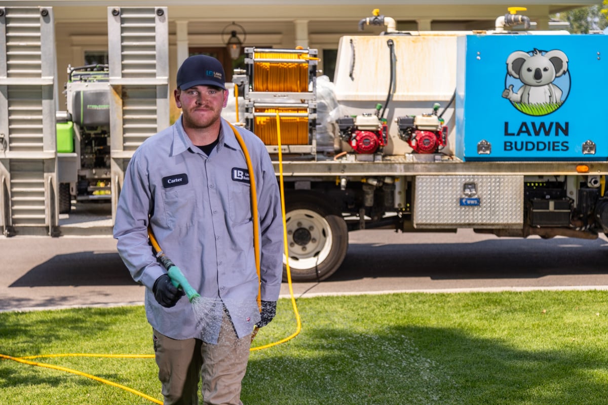 lawn care technician and Lawn Buddies truck