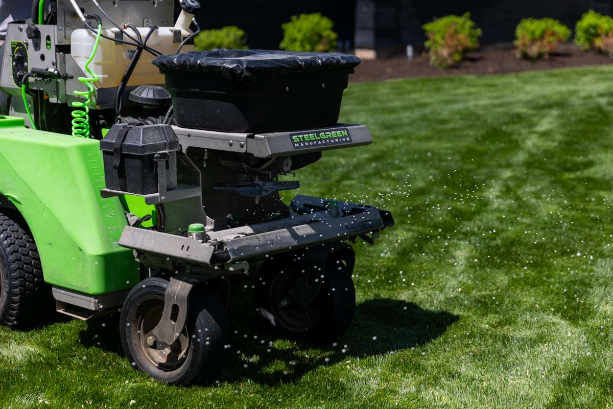 Stand On Granular Fertilization Spreader Technician Crew Grass Lawn 3