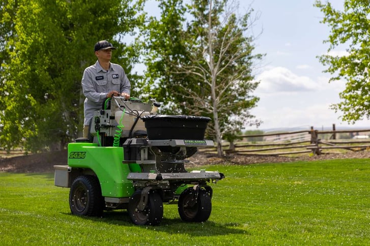 Stand On Granular Fertilization Spreader Technician Crew Grass Lawn 7
