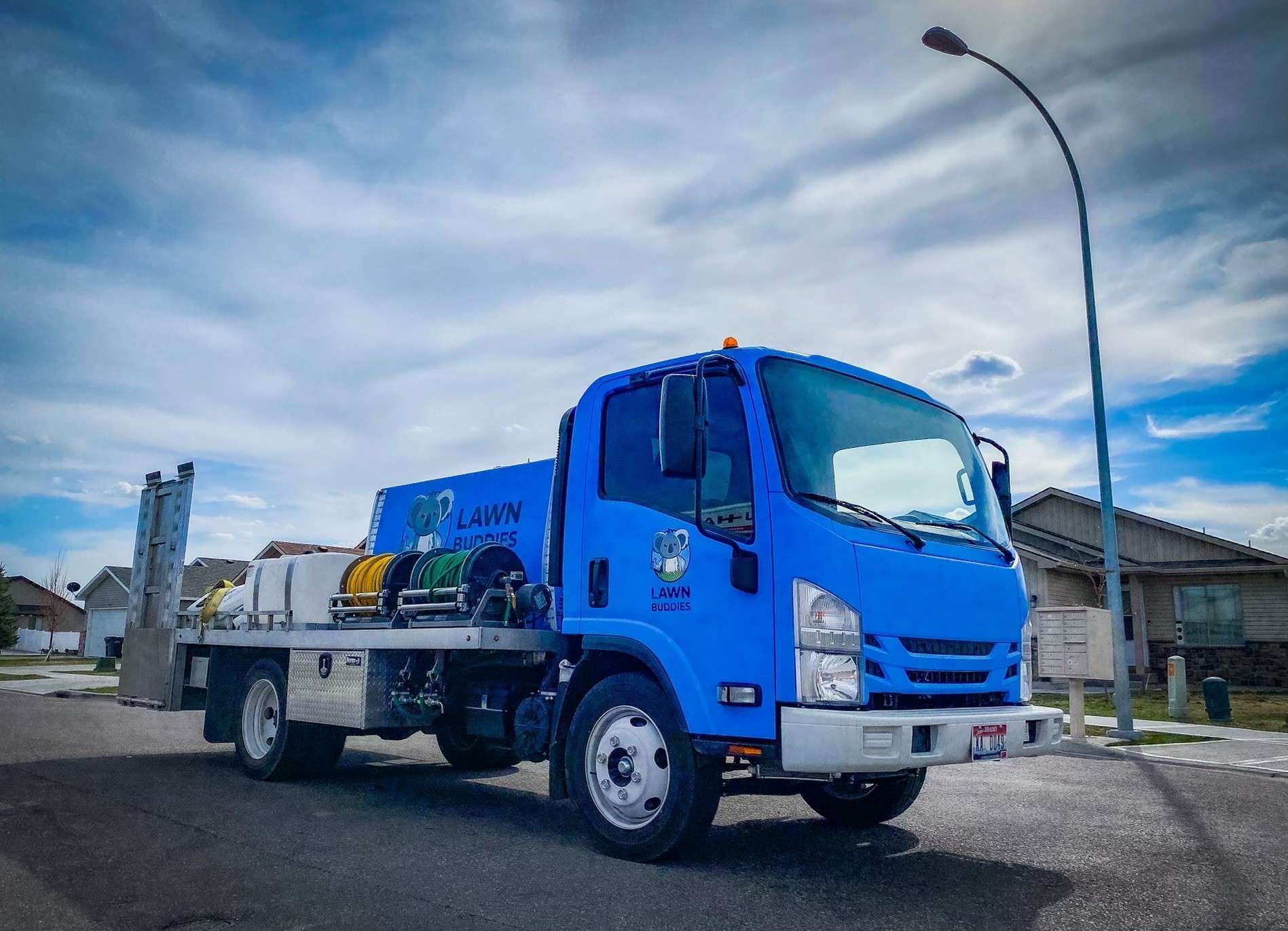 Lawn Buddies Truck with reels to spray for pests