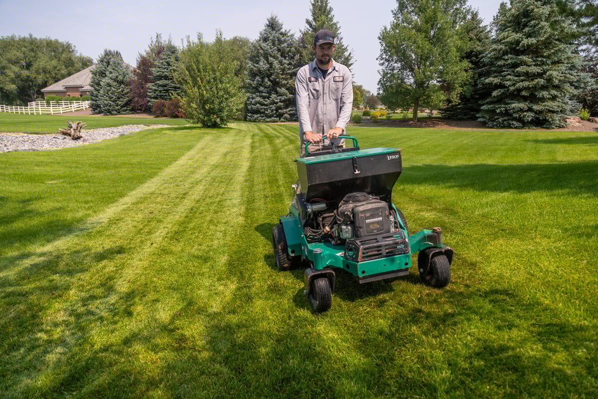 crew technician machine fertilizer green grass lawn turf lines action service 6