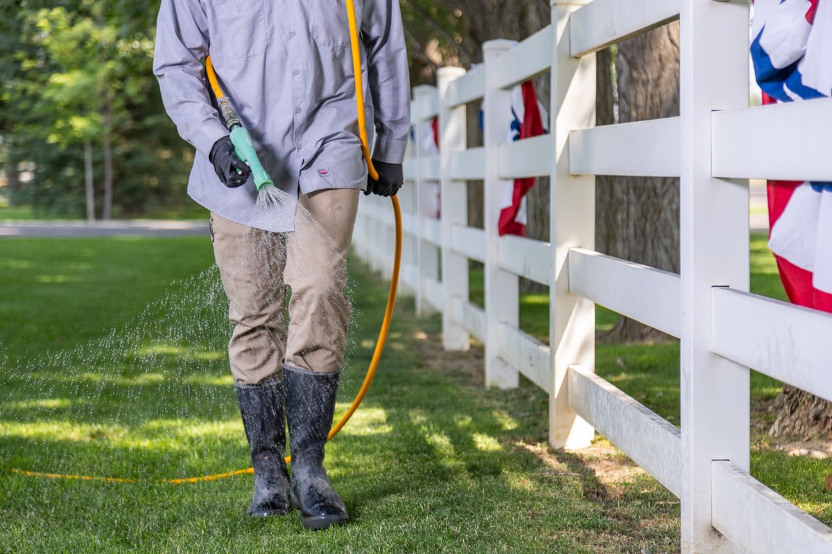 lawn turf fence spray action crew technician green 5