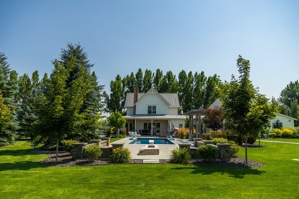 plants turf gravel pool pergola house trees evergreens patio grass 2