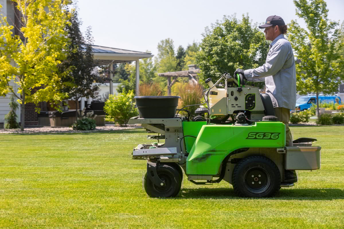 technician crew machine lawn fertilizer service yard house